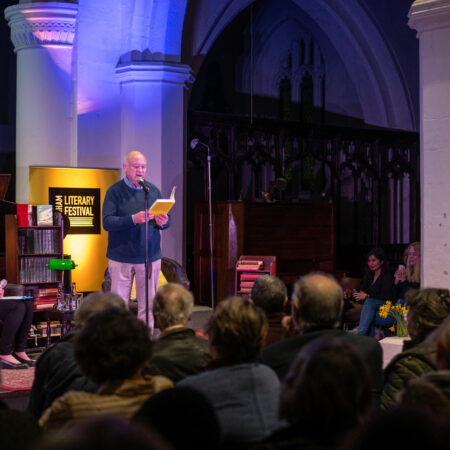 Author reading to a crowd